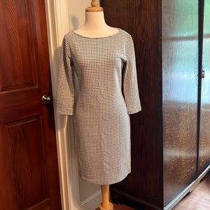 Dress— just above knee length.